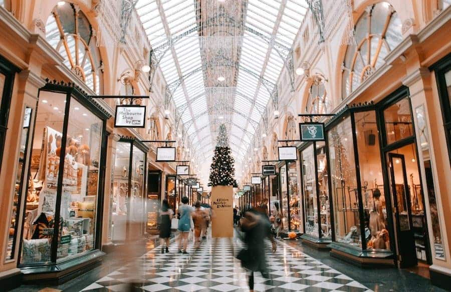 Block Arcade Melbourne. A light filled shopping arcade with high ceilings and checkered tile floors.