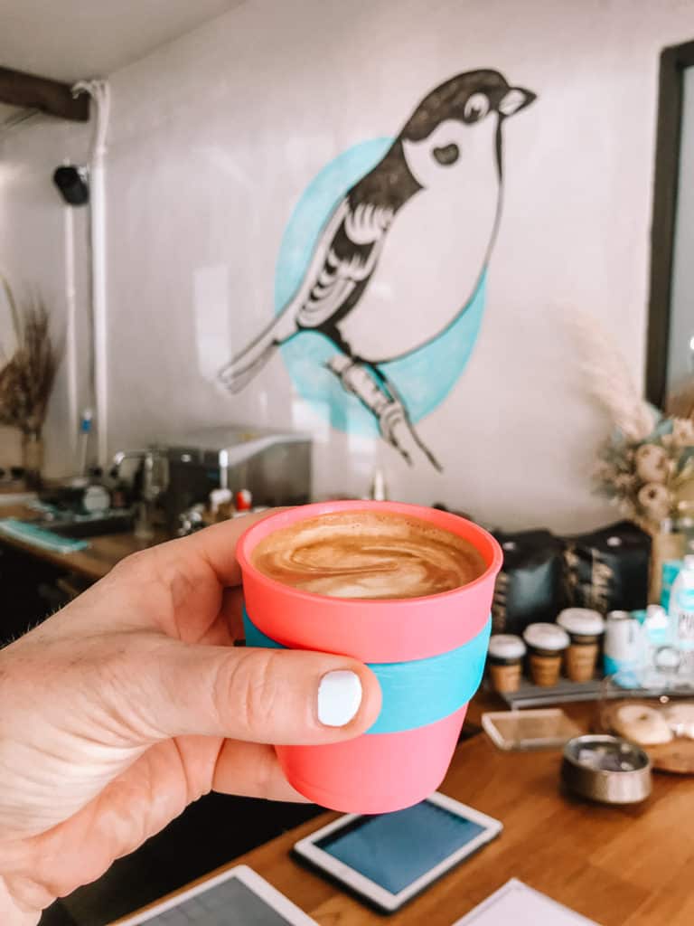 Sparrow Coffee interiors with cute bird artwork in Port Douglas