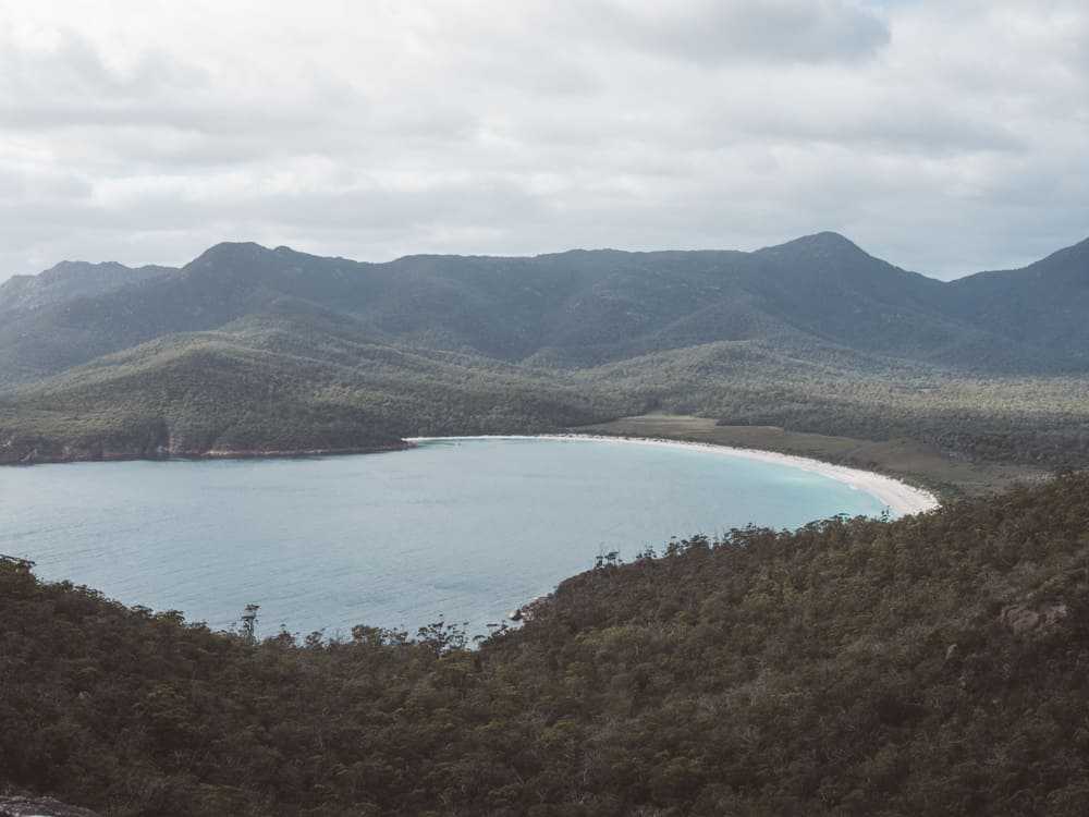 View of wineglass bay from lookout - where to visit on a romantic weekend getaways Tasmania