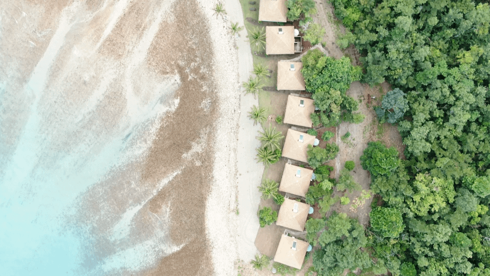 Aerial view of luxury villas at Elysian Eco Retreat on Long Island in Queensland